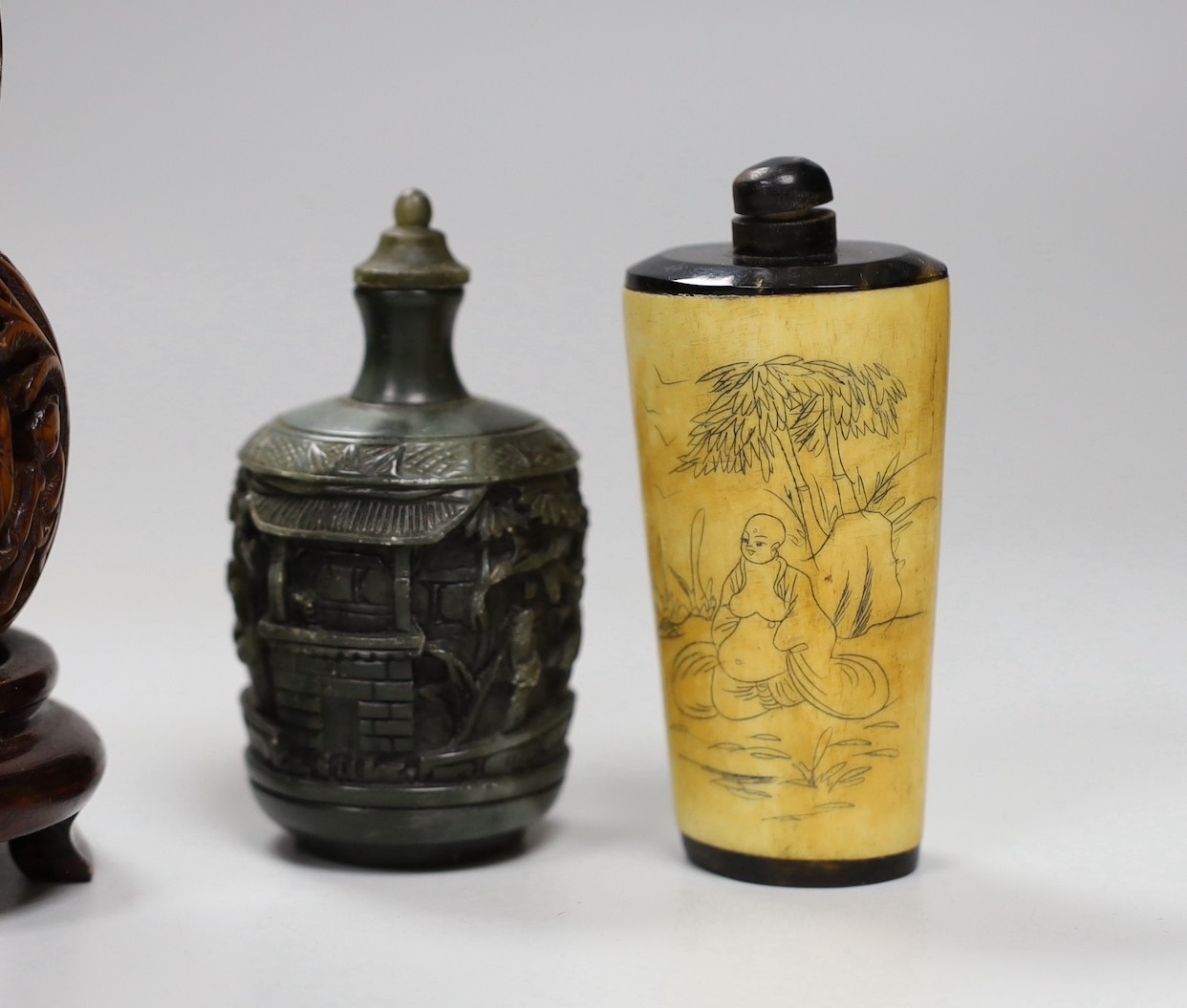 A collection of moulded resin snuff bottles